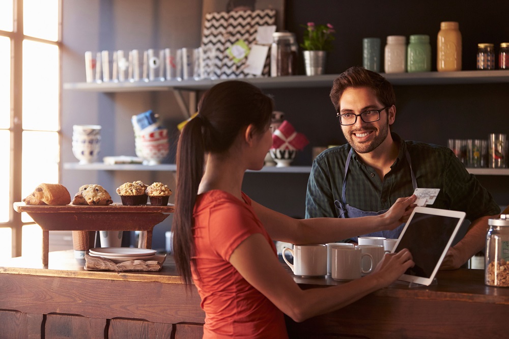 Small Business Cafe - Customer making payment