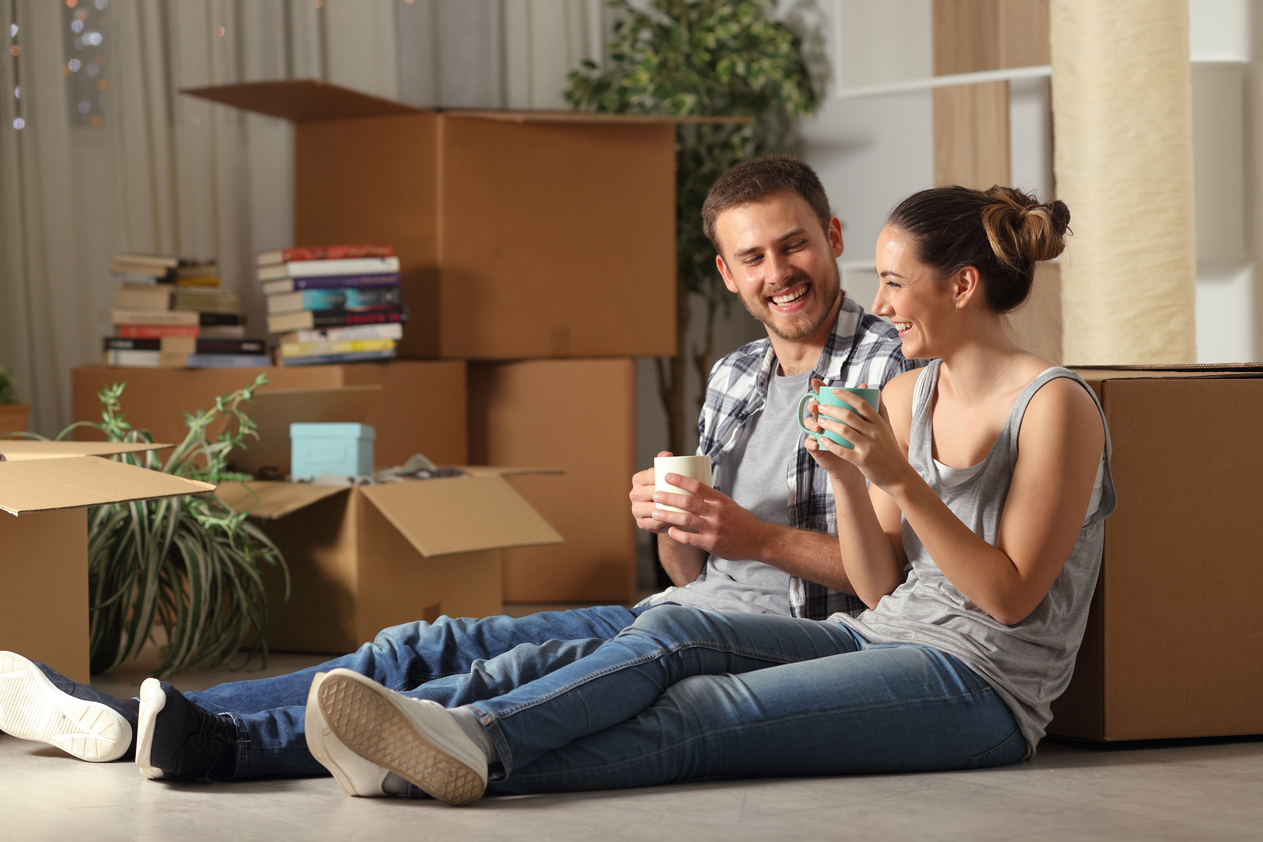 Couple relaxing after moving house