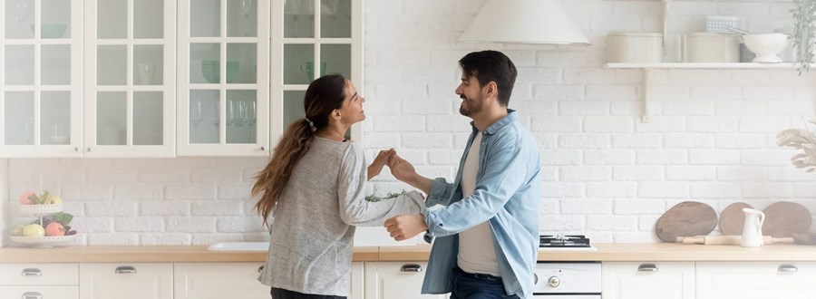 Couple happy in home with Home Loan from Heritage Bank Couple happy in home with Home Loan from Heritage Bank