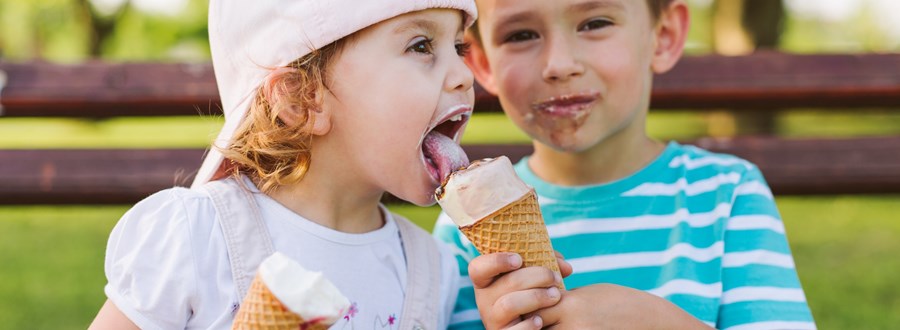 Two kids eating icecream