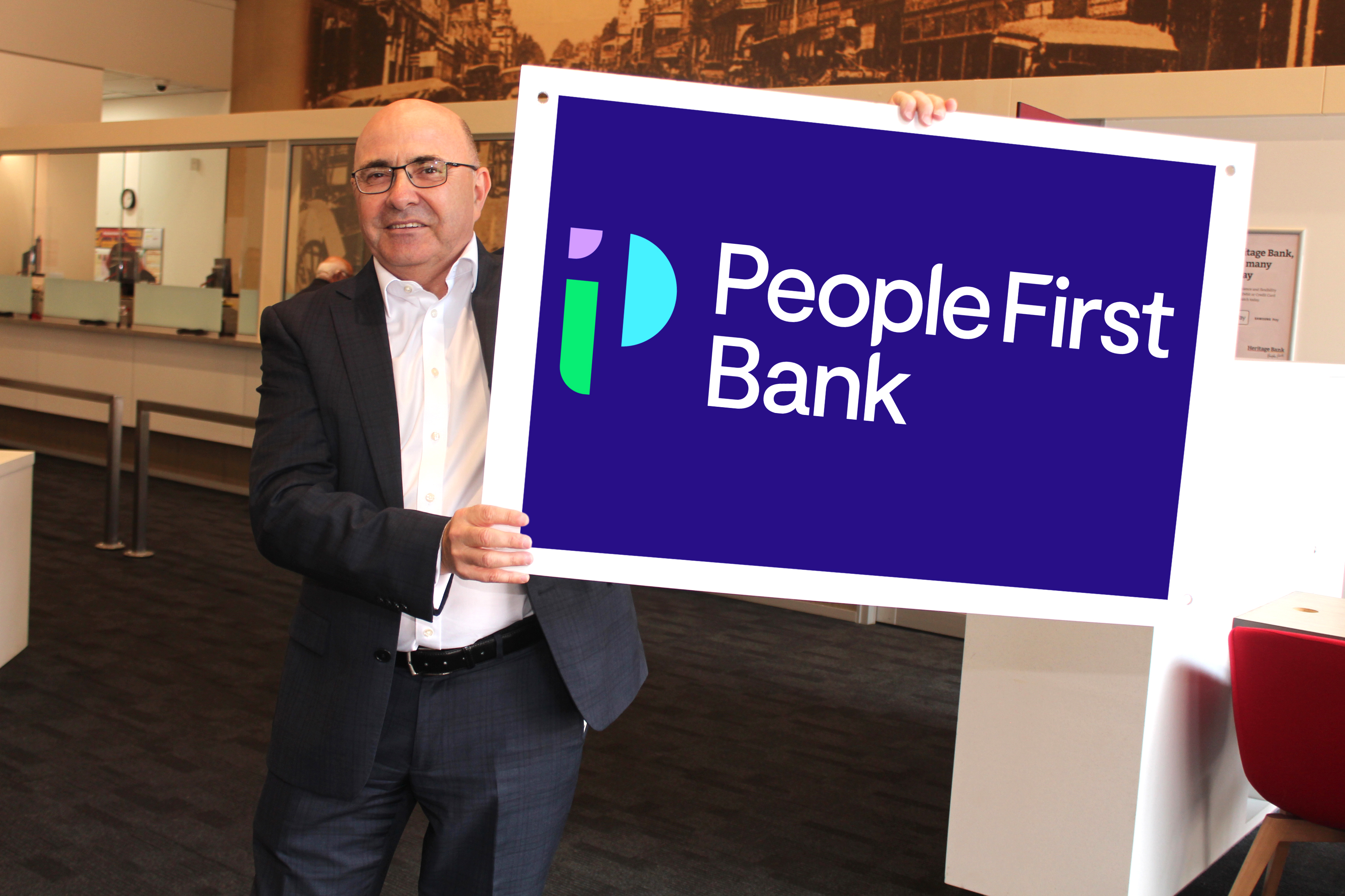 CEO Peter Lock with a sneak peek at the new People First Bank brand